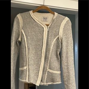 Gray and off-white zip up knit sweater. Very soft.